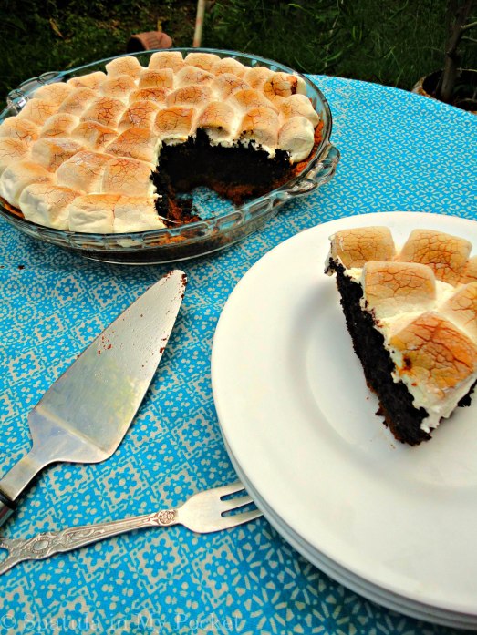 S'more brownie pie! Not just any pie...a biscuit crust, a brownie filling, and topped with gooey roasted marshmallows. 
