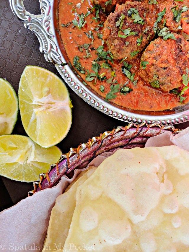 Soft, succulent kebabs smothered in a rich spicy tomato gravy.