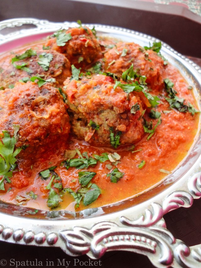 Soft, succulent kebabs smothered in a rich spicy tomato gravy.