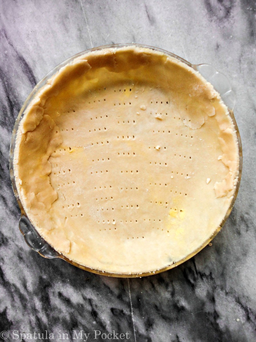 Peach Crumble Pie. A flaky crust filled with juicy peaches and topped with a walnut cinnamon crumble. It’s sweet. It’s juicy. It’s delicious.