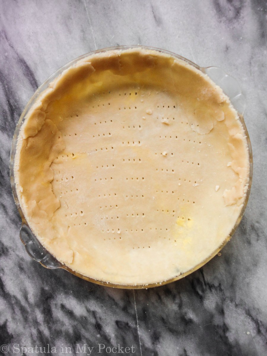 Peach Crumble Pie. A flaky crust filled with juicy peaches and topped with a walnut cinnamon crumble. It’s sweet. It’s juicy. It’s delicious.