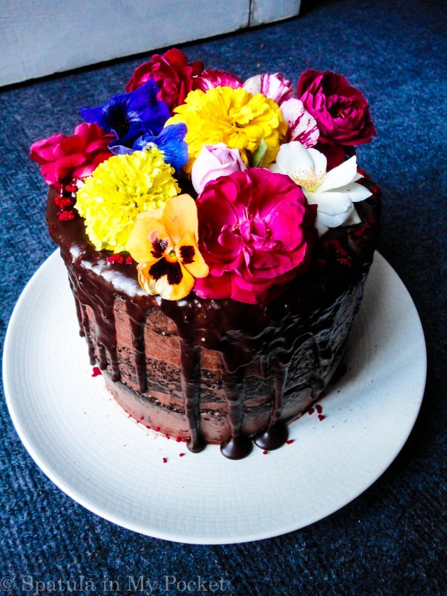 3 layers of rich moist chocolate cake, sandwiched with a dreamy creamy chocolate fudge frosting, and topped with drizzles of smooth lush chocolate ganache.