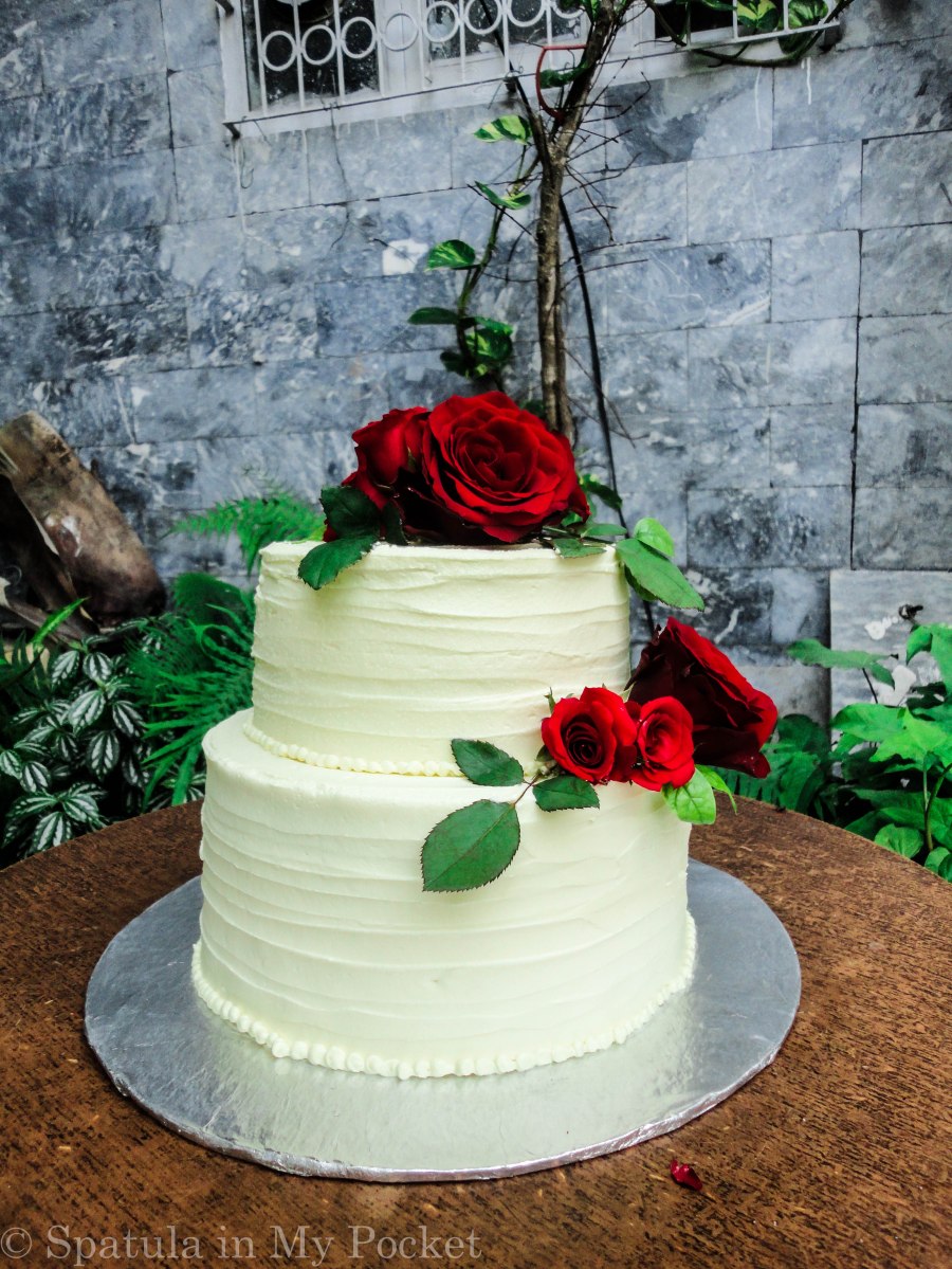 Wedding cake with fresh roses