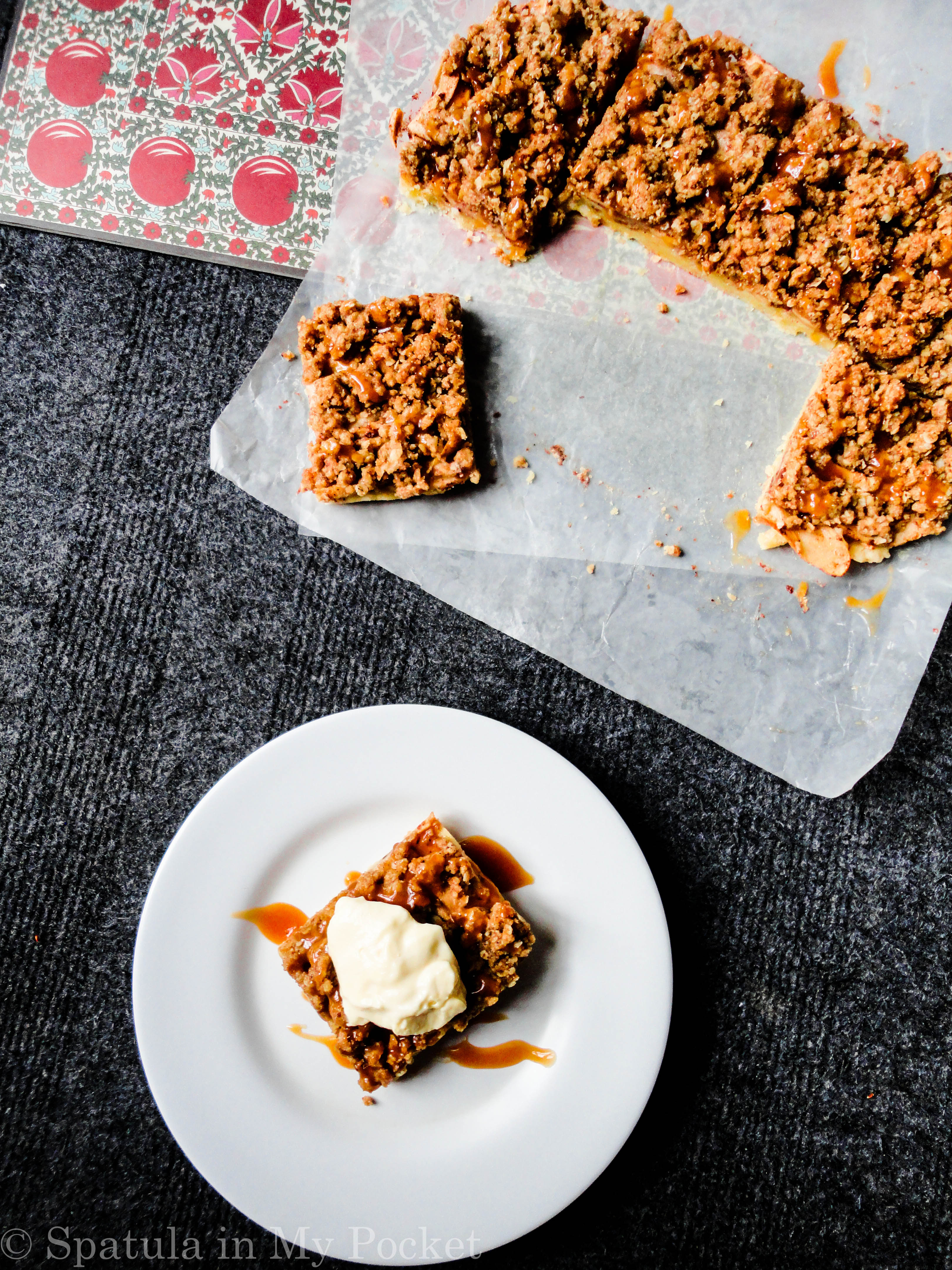 Shortbread crust. Cinnamon apples. Crumb topping. Salted caramel. Apple pie bars...The perfect fall dessert!