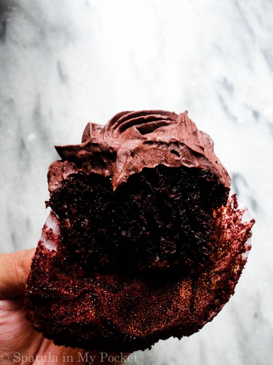 Moist chocolate cupcakes topped with a fudgy chocolate frosting