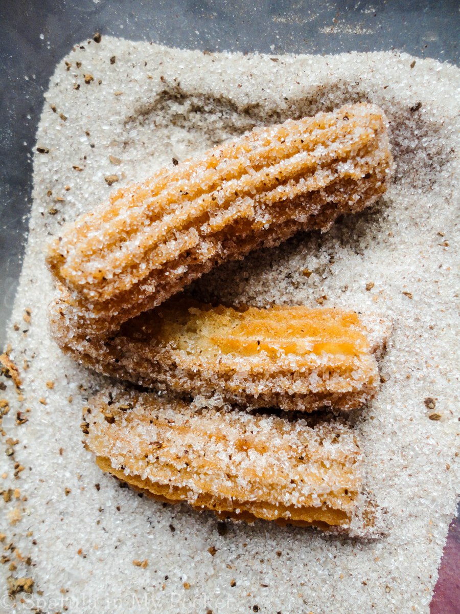 Crispy, golden churros rolled in cinnamon and sugar and dunked in a dark chocolate sauce #churros