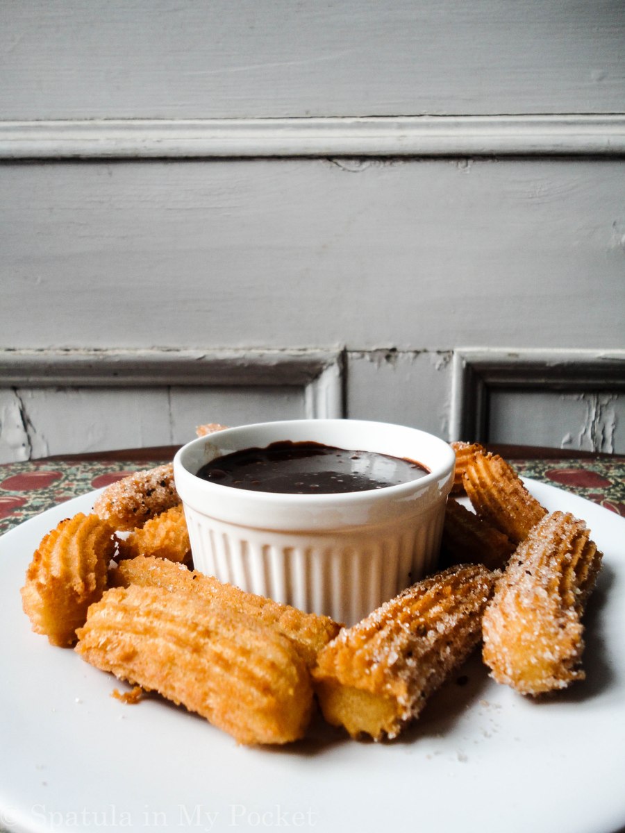 Crispy, golden churros rolled in cinnamon and sugar and dunked in a dark chocolate sauce #churros