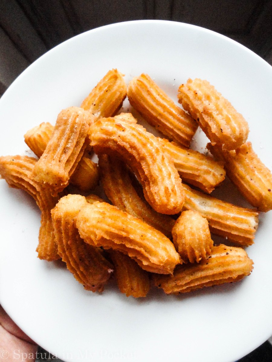 Crispy, golden churros rolled in cinnamon and sugar and dunked in a dark chocolate sauce #churros