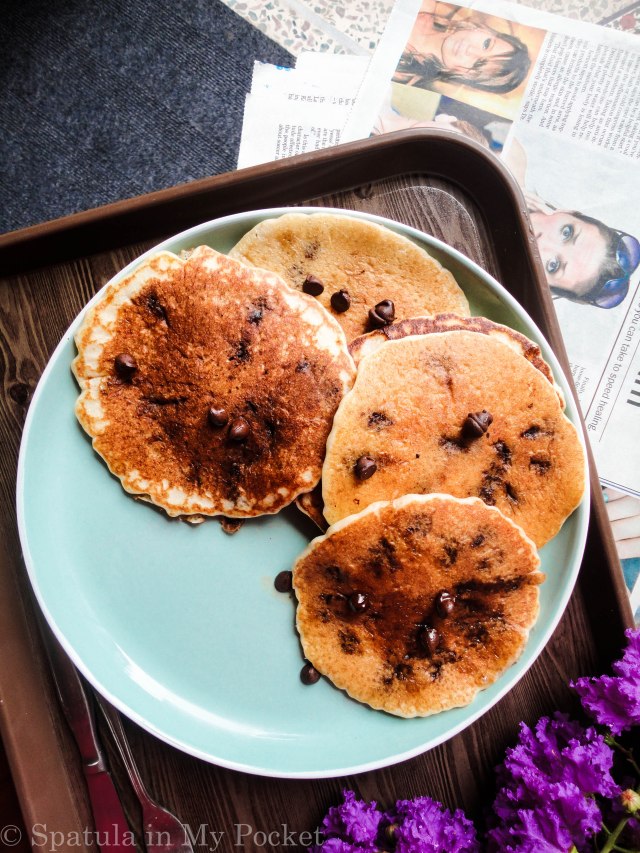 The ultimate recipe for the ultimate stack of pancakes, sweetened with bananas, and loaded with melty gooey chocolate chips. #banana #chocolatechip #pancakes